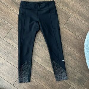 Lululemon tight stuff, high-rise leggings with side pockets, size 8